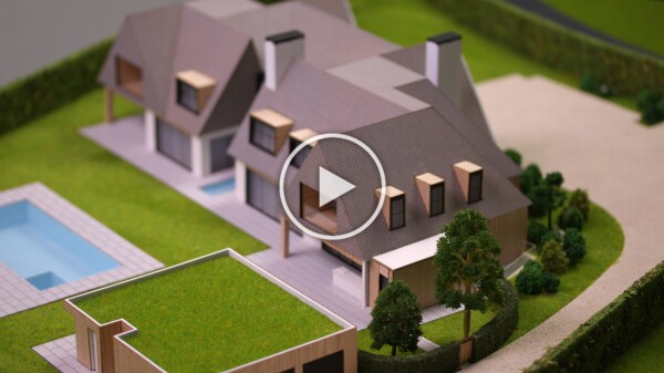 Maqueta de una casa con jardin y piscina